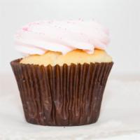 Pink Vanilla Cupcake · Our vanilla bean cake topped with pretty pink vanilla buttercream.