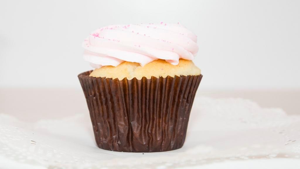 Pink Vanilla Cupcake · Our vanilla bean cake topped with pretty pink vanilla buttercream.
