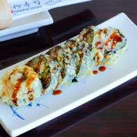 Las Vegas Roll · In: salmon, crab mix, cream cheese, and avocado. Deep-fried and topped with eel sauce and se...