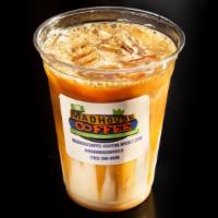 Caramel Macchiato Iced · Espresso poured on Carmel and milk.