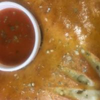 Deluxe Calzone · Sausage, pepperoni, olives, onions, green peppers, mushroom and cheese.