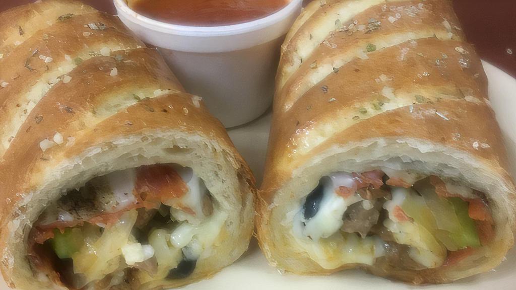 Deluxe Stromboli · Sausage, pepperoni, olives, onions, green peppers, mushroom and cheese.
