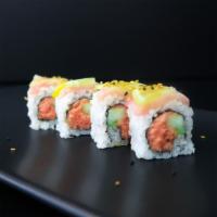 Champa · Spicy Tuna, cucumber topped with yellowtail , lemon, spicy sesame sauce