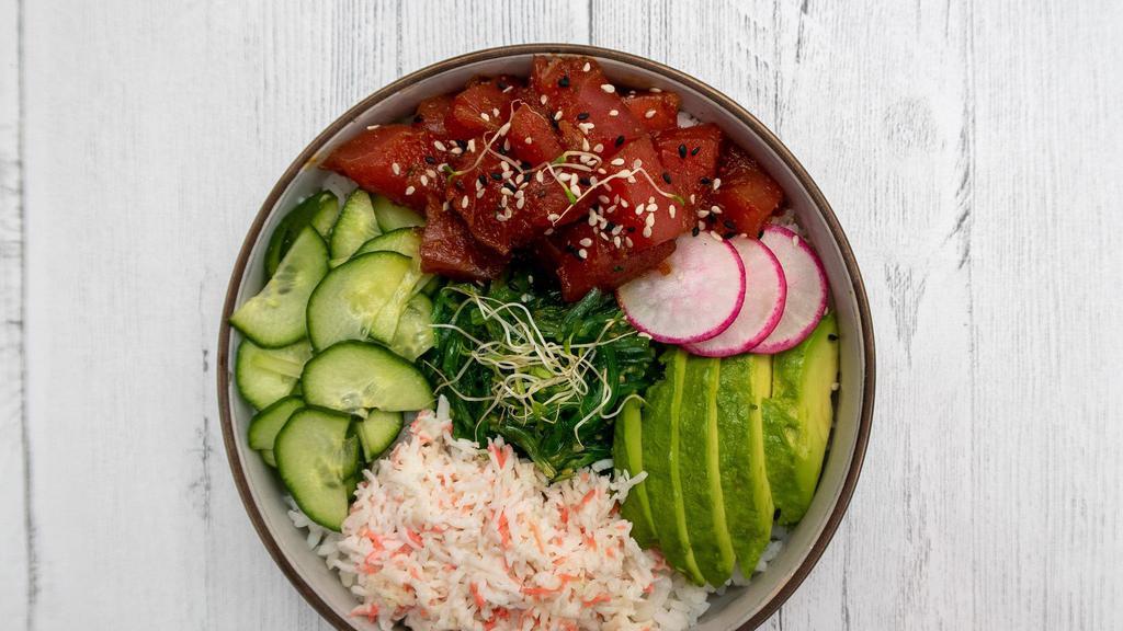 Poke Bowl( Tuna Or Salmon · seaweed salad, avocado, pickled cucumber, radish,crab mix over sushi rice.