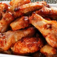 (New) Mango Habanero Wings (10 Pieces) · 10 pieces of Mango Habanero wings. Wings are tossed with a special sauce that has a little s...