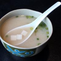 Miso Soup · Hot soy based soup, tofu, green onion, seaweed