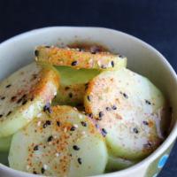 Cucumber Salad · thick sliced, cucumbers, asian style dressing