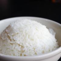 Bowl Of Rice · warm, white, short grain, steamed rice, 
[good sized portion]