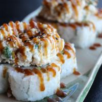 Scallop Volcano Roll · Crab, avocado with cooked scallop, green onion & sweet sauce on top.