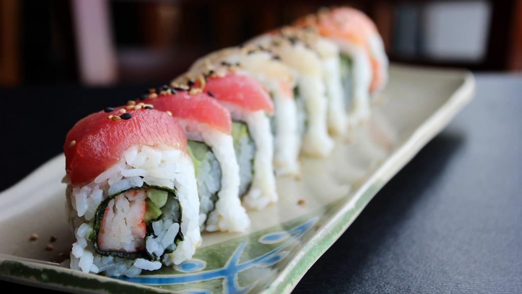 Rainbow Roll * · Crab, avocado and cucumber with tuna, salmon, snapper and ponzu on top. [CONTAINS RAW INGREDIENTS]