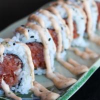 Spicy Tuna Long Roll * · Tuna and spicy sauce.

[CONTAINS RAW INGREDIENTS]