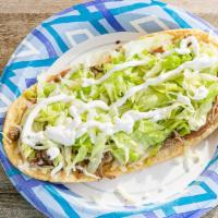 Huarache · Your choice of meat. Lettuce, avocado, cheese, sour cream, beans.