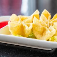 Crab Rangoons (4) · Extra crispy wontons filled with crab meat and a cream cheese base.