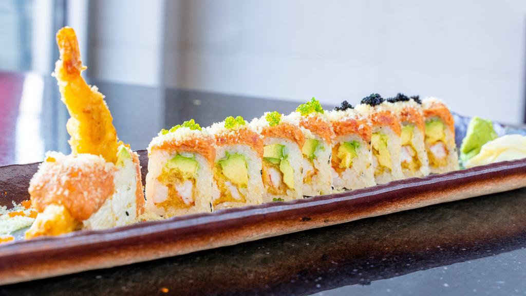 Snow White Roll · shrimp tempura,snow crab,avocado,asparagus inside ,wrapped with white soy paper and  spicy crunch tuna on top with tobiko