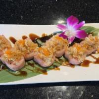 Sakura Roll · spicy tuna ，salmon，avocado wrapped with pink soypaper ，top with spicy  crab crunch and chef ...