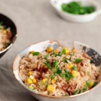 Chicken Fried Rice · Made with Chicken thigh with green onions and garlic