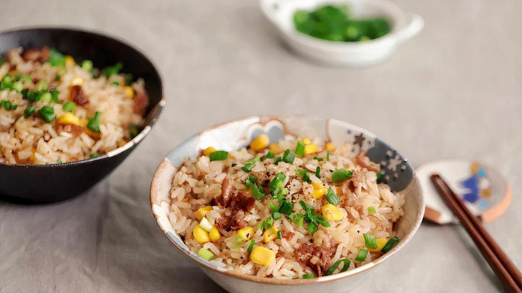 Chicken Fried Rice · Made with Chicken thigh with green onions and garlic