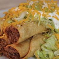 #25- 5 Rolled Tacos · Beef or Chicken Rolled Tacos With lettuce,guacamole,sour crem,cheddar cheese and enchilado c...