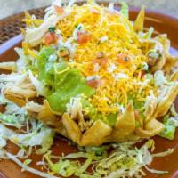 #27 Taco Salad · With beans,guacamole,salsa mexicana (pico de gallo),lettuce,cheddar cheese,and enchilada che...