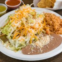 Beef Taco & Cheese Enchilada · Shredded beef taco and cheese enchilada Served with Rice and Refried Beans (No substitutions.)