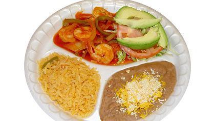 Camarones Rancheros · Cooked with butter, bell peppers, onion, tomato, tomato sauce, tapatio sauce (medium spicy). wiht lettuce sliced tomato six avocado.