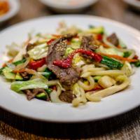 Udon Bohkeum · Vegetarian. Stir-fried rice noodle with veggies and beef, chicken or tofu.