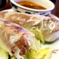Thai Spring Rolls · Most popular. Two pieces. Choice of shrimp or tofu with a hint of rice noodles. Served with ...