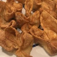 Crab Cheese Wontons (8) · Eight pieces.