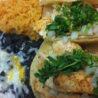 Halibut Taco Plate (3) · Soft tacos filled with tender halibut and topped with cilantro and finely diced onions. Serv...