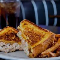 Tuna Melt Sandwich · Grilled tuna and cheddar cheese. Served with our hand cut French Fries
