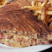 Patty Melt Sandwich · 6oz. ground Beef patty served on grilled marbled rye with caramelized onions and Swiss cheese.