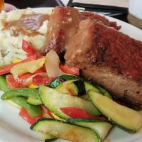 Blue Plate Meatloaf · Ground beef cooked with our secret seasonings served with mashed potatoes, beef gravy and ve...