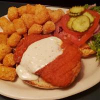 Buffalo Chicken Burger · Crispy fried chicken breast tossed in wing sauce and topped with bleu cheese dressing, lettu...