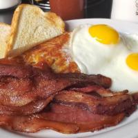 2 Egg Combo · Two extra-large eggs with your choice of ham steak or 4 strips of bacon or or 4 links or 2 s...