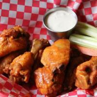 Wings · A basket of wings in your choice of BBQ, hot BBQ or sweet chili sauce served with celery sti...