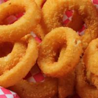 Onion Rings · Thick cut and beer-battered. With choice of dipping sauce.