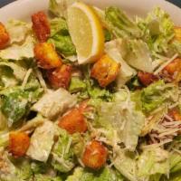 Caesar Salad · Fresh romaine lettuce tossed with croutons, parmesan cheese and Caesar dressing.
