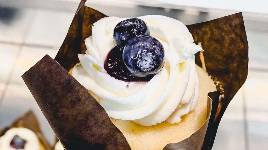 Gf Berry Tilly · Gluten-free vanilla cake soaked with a berry simple syrup, filled with triple berry mousse, topped with Chantilly icing and fresh berries