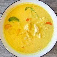Yellow Curry · A mild-flavored yellow curry cooked in coconut milk, potato, white onion, bell pepper, and c...