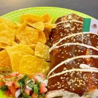 Wet Mole Burrito · Chicken in mole sauce, beans, rice sour cream, pico de gallo, and chips.