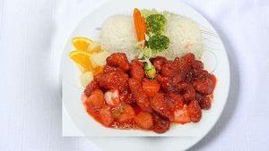 Sweet & Sour Chicken · Deep-fried chicken sautéed with pineapple, onion, and green bell peppers in a sweet and sour...