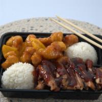 Chicken & Orange Chicken · Teriyaki chicken and sautéed deep-fried chicken in a homemade orange sauce served with rice.