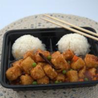 General Tso Tofu · Served with steamed rice.