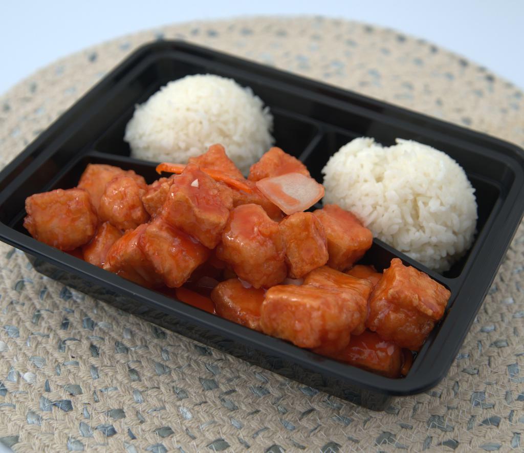 Sweet & Sour Tofu · Served with steamed rice.