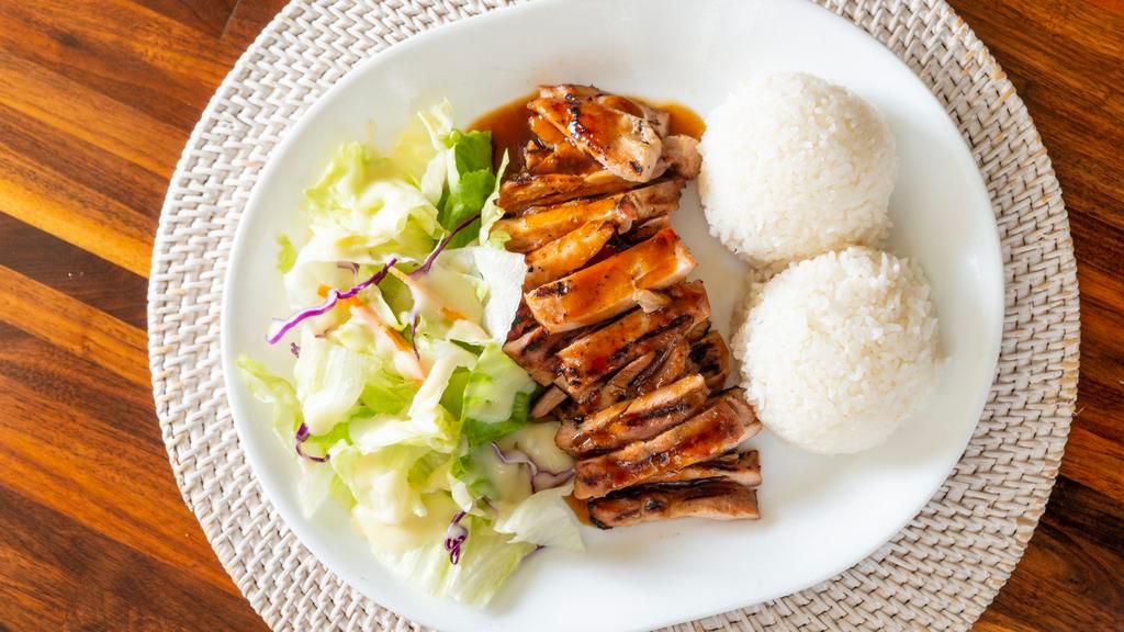 Spicy Chicken Teriyaki · Teriyaki chicken sauteed in a spicy sauce served with rice and salad.
