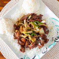 Mongolian Beef · Beef sautéed with white and green onions, served with rice.