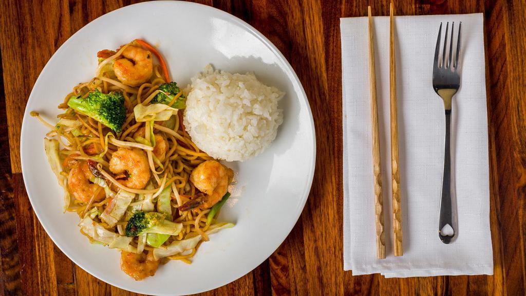 Prawn Yakisoba · Prawns sautéed with broccoli, cabbage, onions, bean sprouts, and noodles in a savory sauce served with one scoop of rice.