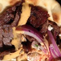10-Large Beef Shawarma  Gyro  · Beef, lettuce, tomato,  and choice of sauce.