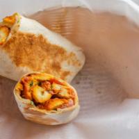4-Large Chicken Shawarma  Saj  · Chicken Saj comes with lettuce, tomato,  and choice of sauce.( Hot Sauce, Garlic Sauce )
