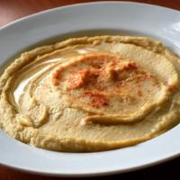 Famous Hummus With 2 Sides Of Pita · Our famous homemade hummus, with two side pita bread. Mom's homemade recipe, made with chick...